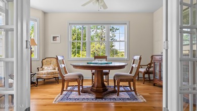 Warm, custom-built, and genuinely one of a kind, this waterfront - photo 5