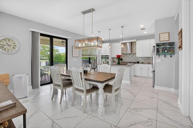 Discover waterfront living in Palm Meadows Estates. This - photo 16