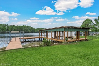 Welcome Home to this extraordinary lakefront retreat situated on - photo 9