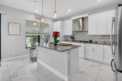 Discover waterfront living in Palm Meadows Estates. This - photo 19
