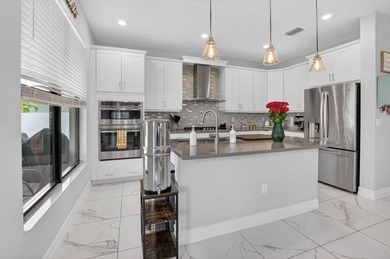 Discover waterfront living in Palm Meadows Estates. This - photo 20