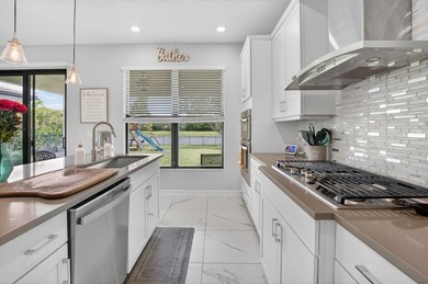 Discover waterfront living in Palm Meadows Estates. This - photo 22