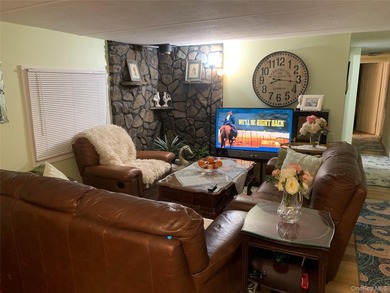 This Spectacular, fully renovated mobile home (2024) set on its - photo 1