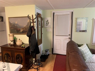 This Spectacular, fully renovated mobile home (2024) set on its - photo 2