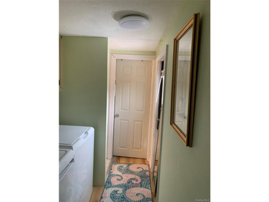 This Spectacular, fully renovated mobile home (2024) set on its - photo 6