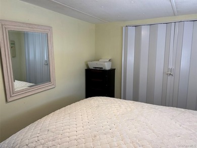 This Spectacular, fully renovated mobile home (2024) set on its - photo 7