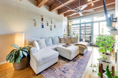 Step into this stunning brick-and-timber loft at the Premiere