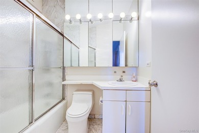 The Summit Condominium presents a 1004 sqft Penthouse Apartment - photo 32