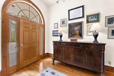 Set on nearly nine beautifully maintained acres along the - photo 15