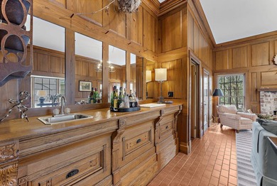 Set on nearly nine beautifully maintained acres along the - photo 17