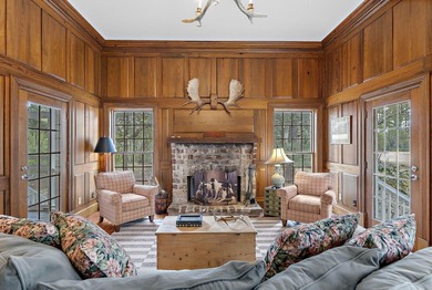 Set on nearly nine beautifully maintained acres along the - photo 22