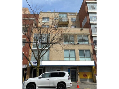 Welcome to this incredible mixed-use building, located in the - photo 1