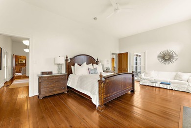Set on nearly nine beautifully maintained acres along the - photo 41