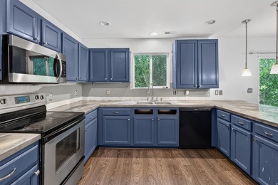 Welcome to this beautifully kept two-story home in one of - photo 5