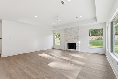 This 4 bed, 3.5 bath home sits on a flat 0.5 acre lot with 115' - photo 11