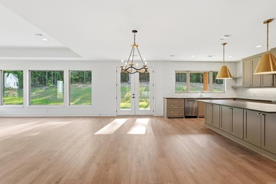 This 4 bed, 3.5 bath home sits on a flat 0.5 acre lot with 115' - photo 16