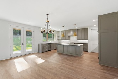 This 4 bed, 3.5 bath home sits on a flat 0.5 acre lot with 115' - photo 17