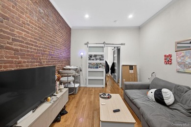 A 25' wide, five story, 20 unit multifamily is now offered by - photo 17