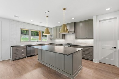 This 4 bed, 3.5 bath home sits on a flat 0.5 acre lot with 115' - photo 19