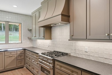 This 4 bed, 3.5 bath home sits on a flat 0.5 acre lot with 115' - photo 20