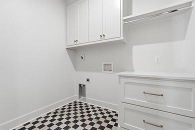 This 4 bed, 3.5 bath home sits on a flat 0.5 acre lot with 115' - photo 27