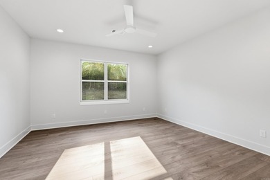This 4 bed, 3.5 bath home sits on a flat 0.5 acre lot with 115' - photo 38