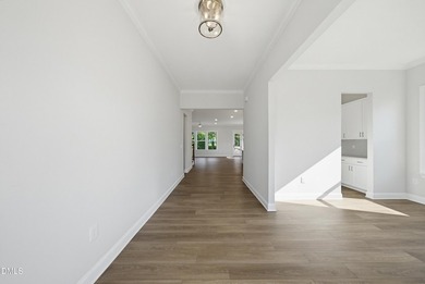 Experience elevated living in one of Hasentree's most private - photo 3