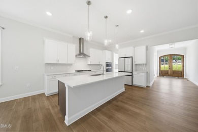 Experience elevated living in one of Hasentree's most private - photo 9