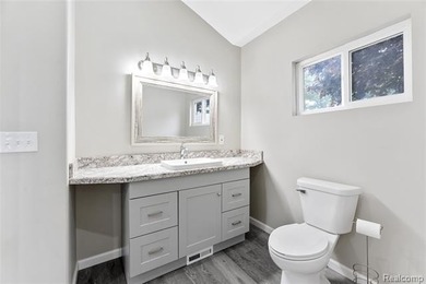 Discover beach living in this completely remodeled home just two - photo 12