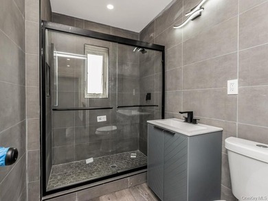 Immaculate Newly Renovated Brick semi attached 1 Family Home - photo 13