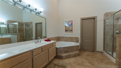 Come home to this inviting, welcoming villa at The Palms in Lake - photo 13