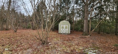 This is a Lovely U-Shaped Sprawling Ranch on over an acre of - photo 17