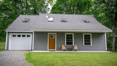 Modern efficiency meets relaxed coastal living at 98 River Road - photo 1