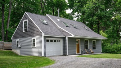 Modern efficiency meets relaxed coastal living at 98 River Road - photo 2
