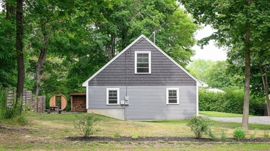 Modern efficiency meets relaxed coastal living at 98 River Road - photo 3