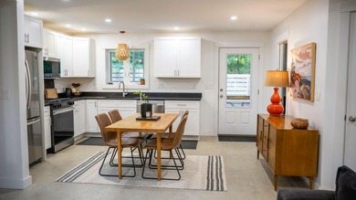 Modern efficiency meets relaxed coastal living at 98 River Road - photo 10