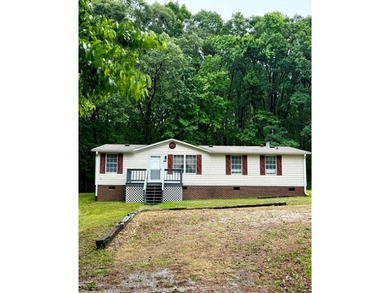 Escape to peaceful country living at Clarksville in this - photo 2