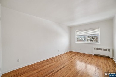 Beautifully renovated 2-bedroom, 1-bathroom condominium located - photo 12