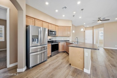 Welcome to this lightly lived-in 3-bedroom + den, 2-bath