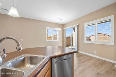 Welcome to this lightly lived-in 3-bedroom + den, 2-bath