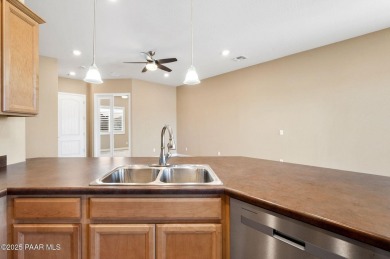 Welcome to this lightly lived-in 3-bedroom + den, 2-bath