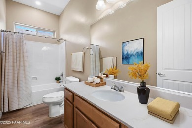 Welcome to this lightly lived-in 3-bedroom + den, 2-bath