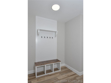 BRAND NEW HOME in the HEART of Osage Beach!! This striking home - photo 18