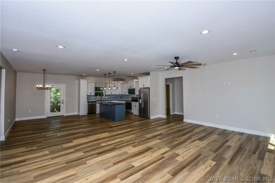 BRAND NEW HOME in the HEART of Osage Beach!! This striking home - photo 19