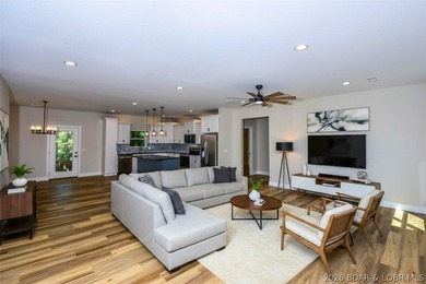 BRAND NEW HOME in the HEART of Osage Beach!! This striking home - photo 20