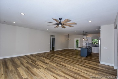 BRAND NEW HOME in the HEART of Osage Beach!! This striking home - photo 21