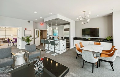 Perched high above Buckhead on the 25th floor, this exceptional