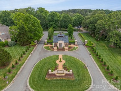 Located in the exclusive gated community of Chatelaine, this - photo 3