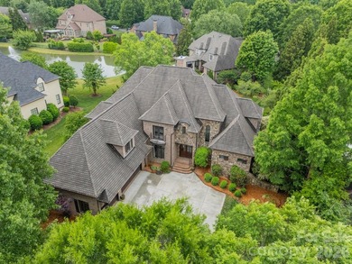 Located in the exclusive gated community of Chatelaine, this - photo 4