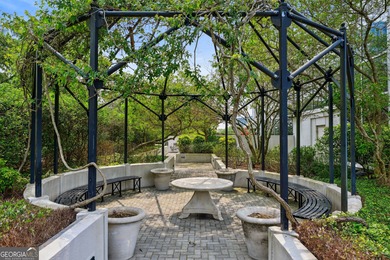 Perched high above Buckhead on the 25th floor, this exceptional